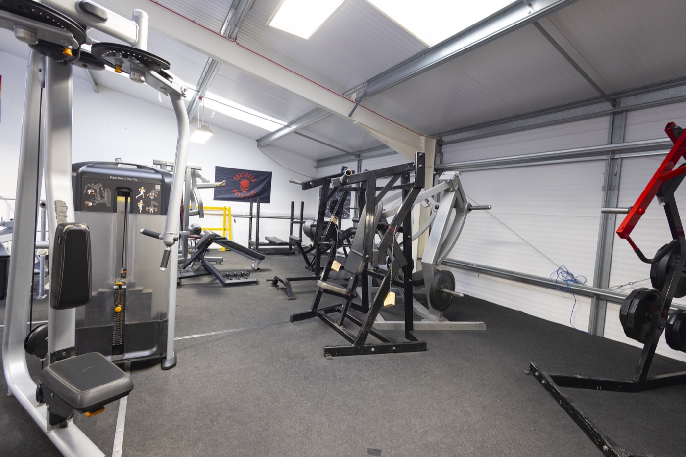 Athlete preparing for squat in upstairs gym